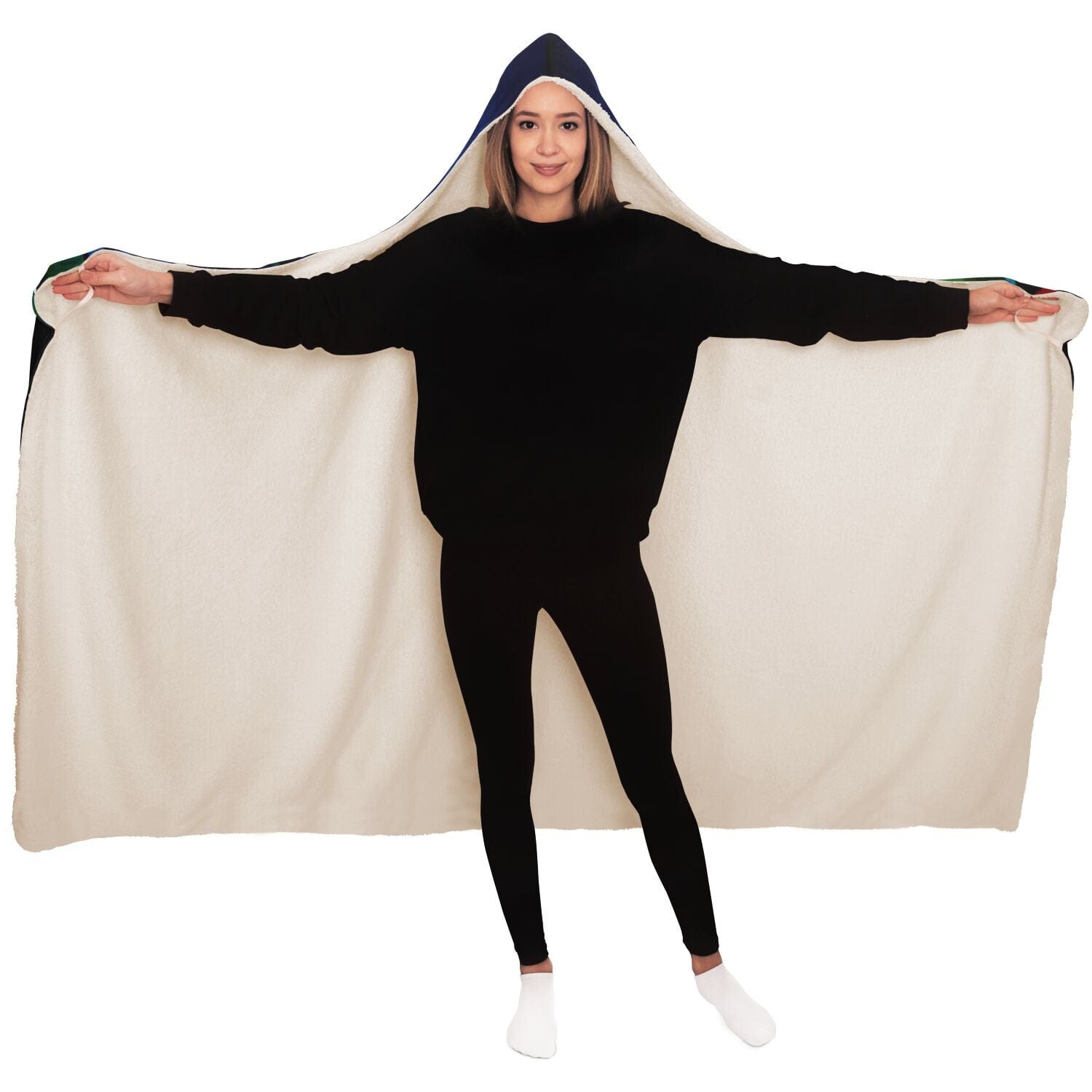A girl showing a unisex adult hooded blanket