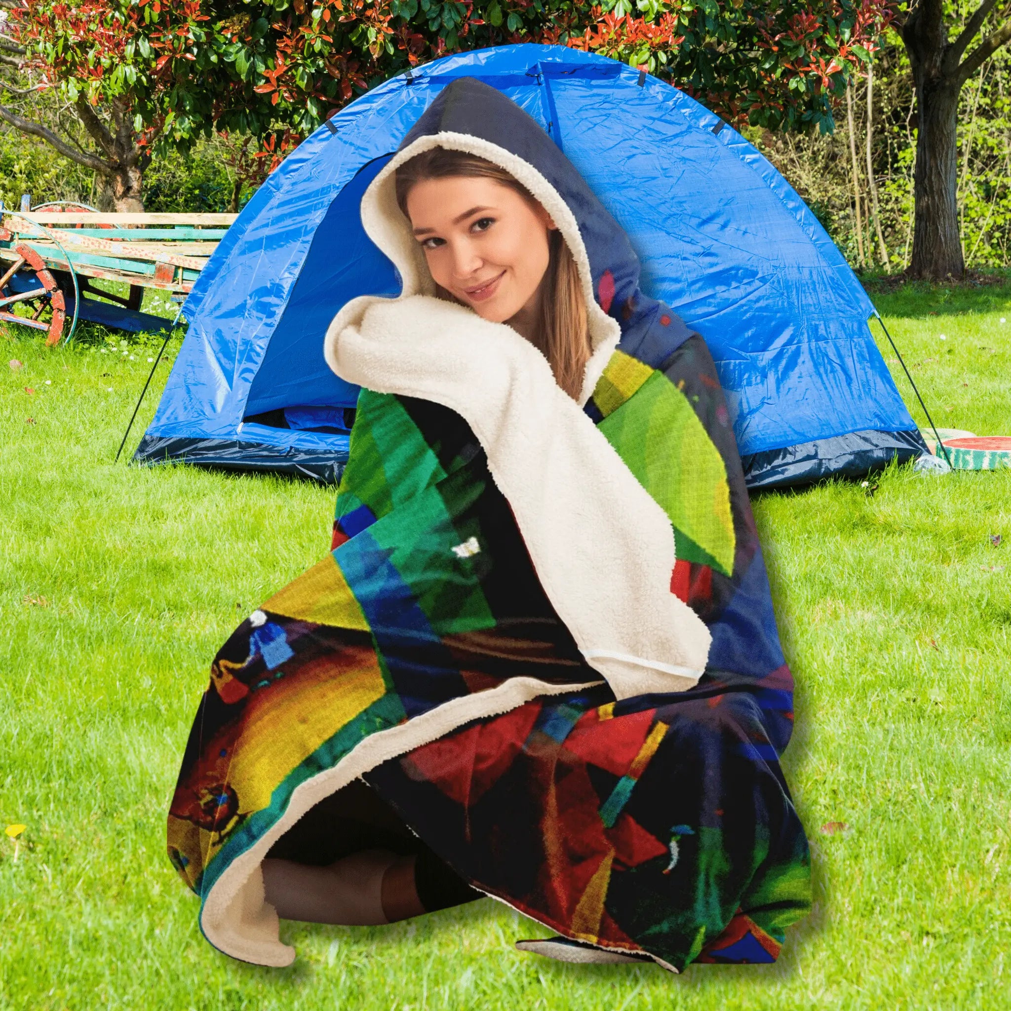 A girl with printed adult hooded blanket